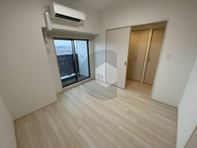 プレジオ森河内ASIANの寝室