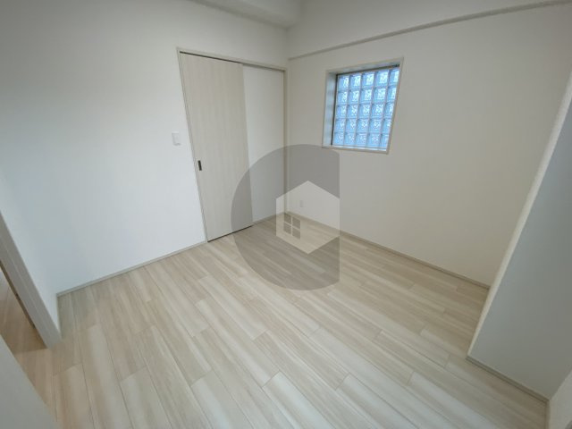 プレジオ森河内ASIANの洋室