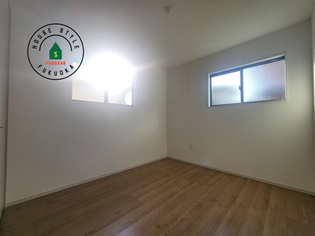 福津市津屋崎1丁目第5-2棟（1号棟）の内観：施工例|落ち着いた色調の洋室です。