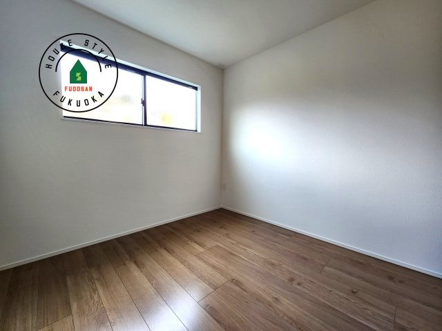 福津市津屋崎1丁目第5-2棟（1号棟）の内観：施工例|落ち着いた色調の洋室です。