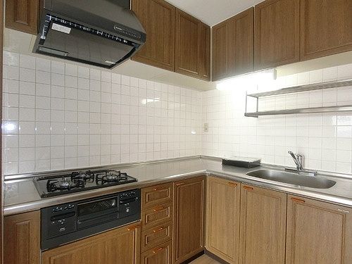 ライオンズマンション古江西のキッチン|Ｌ字型キッチン　※2009年4月撮影