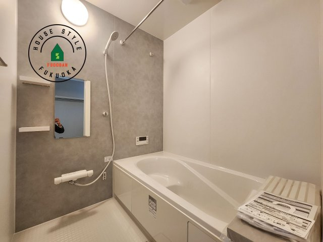 東区奈多2丁目第5-5棟（4号棟）の内観：施工例|1日の疲れを癒してくれる広々バスルーム。雨の日のお洗濯にも大活躍な浴室乾燥機付です！