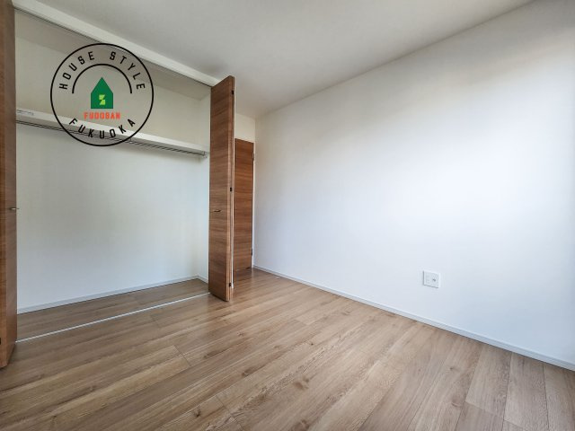 東区奈多2丁目第5-5棟（5号棟）の内観：施工例|落ち着いた色調の洋室です。