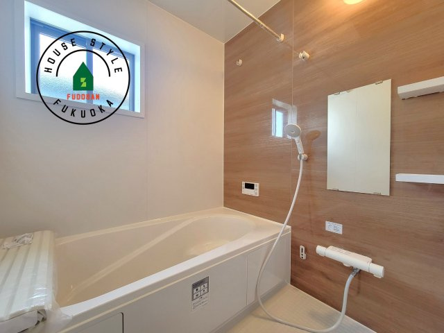 春日市天神山4丁目第1-1棟（1号棟）の内観：施工例|1日の疲れを癒してくれる広々バスルーム。雨の日のお洗濯にも大活躍な浴室乾燥機付です！