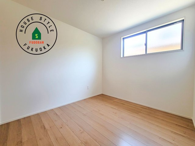 春日市天神山4丁目第1-1棟（1号棟）の内観：施工例|落ち着いた色調の洋室です。