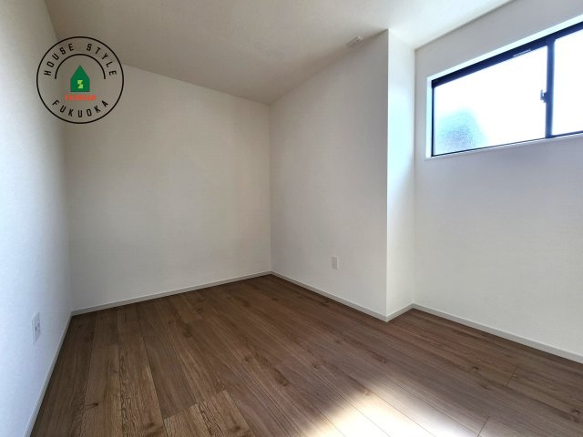 福岡市東区奈多1丁目第2-6棟（1号棟）の内観：施工例|落ち着いた色調の洋室です。