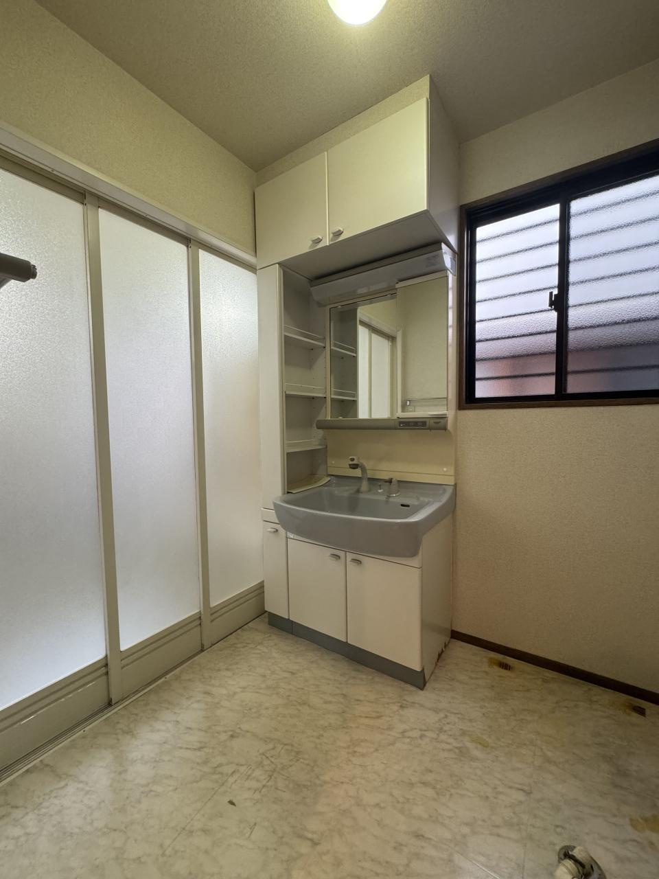 高知市仲田町　中古戸建ての洗面所|１F:洗面脱衣室