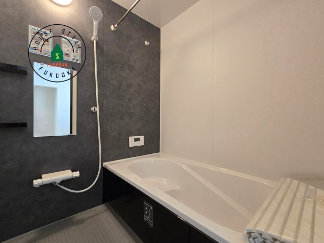 福岡市城南区東油山5丁目第1-3棟（3号棟）の内観：施工例|1日の疲れを癒してくれる広々バスルーム。雨の日のお洗濯にも大活躍な浴室乾燥機付です！