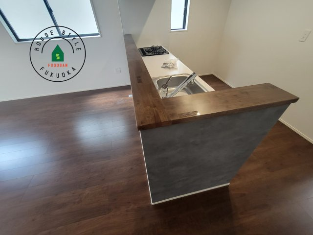 福岡市東区奈多1丁目第2-6棟（2号棟）の内観：施工例|キッチンから立ち込める香りが今日の料理を期待させます。