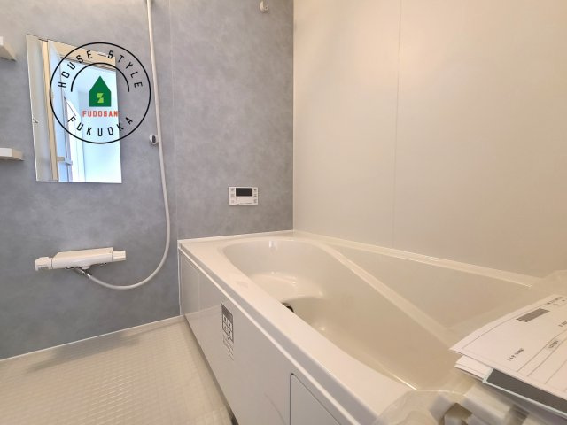 福岡市東区奈多1丁目第2-6棟（3号棟）の内観：施工例|1日の疲れを癒してくれる広々バスルーム。雨の日のお洗濯にも大活躍な浴室乾燥機付です！