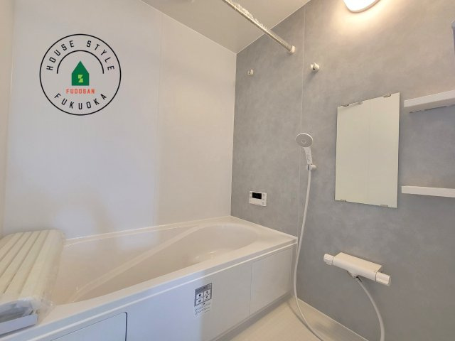 福岡市東区奈多1丁目第2-6棟（4号棟）の内観：施工例|1日の疲れを癒してくれる広々バスルーム。雨の日のお洗濯にも大活躍な浴室乾燥機付です！