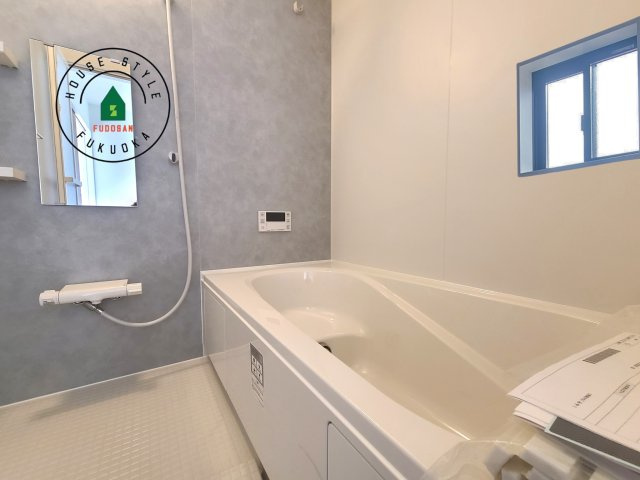 福岡市東区奈多1丁目第2-6棟（5号棟）の内観：施工例|1日の疲れを癒してくれる広々バスルーム。雨の日のお洗濯にも大活躍な浴室乾燥機付です！