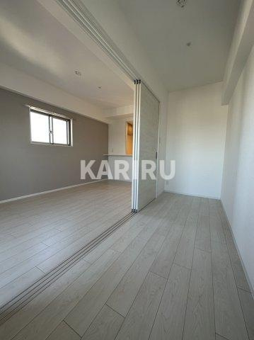 ワールドアイ都島高倉町の洋室