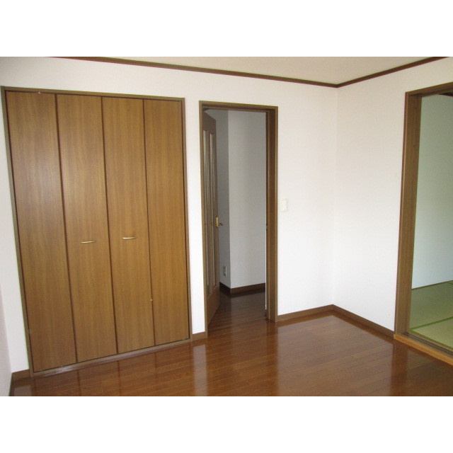 三浦コーポ２０００の居間・リビング|南洋室