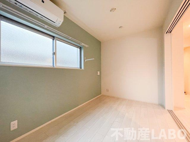 ハーモニーテラス平野市町の洋室