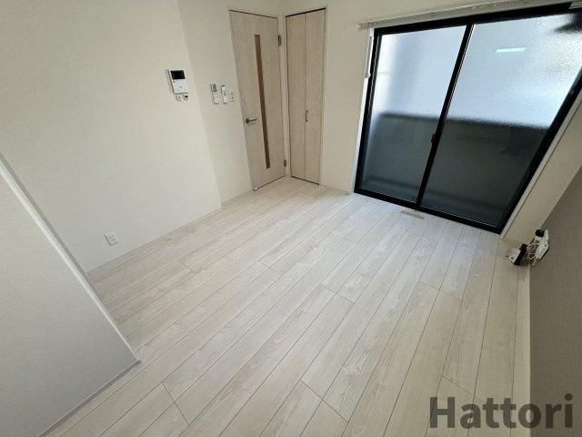 ハーモニーテラス庄内幸町の居間・リビング