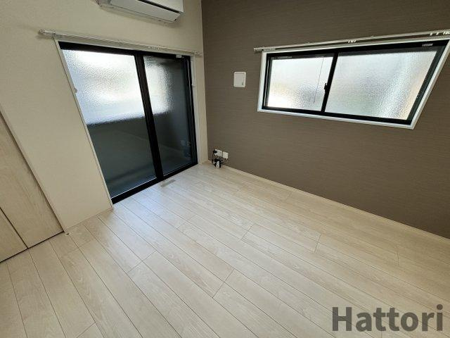 ハーモニーテラス庄内幸町の居間・リビング