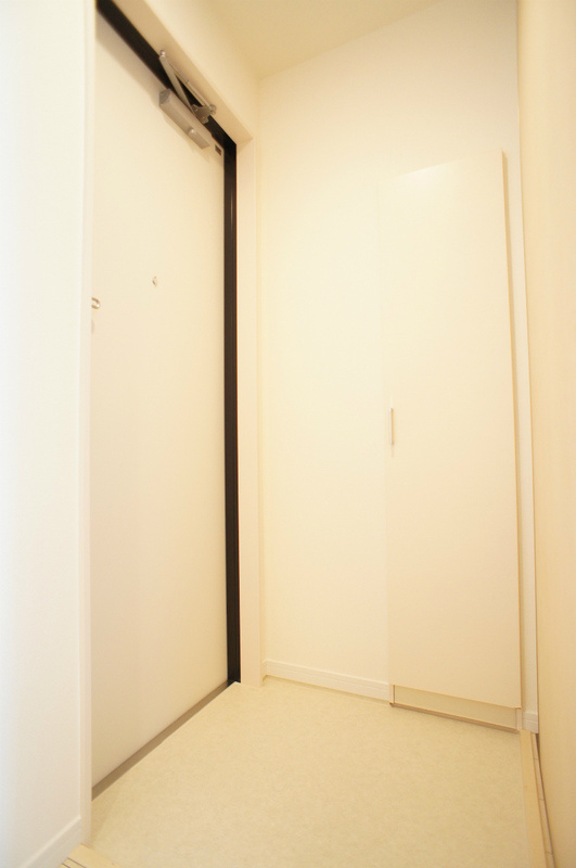 リブリ・Park Hill 東寺尾の玄関