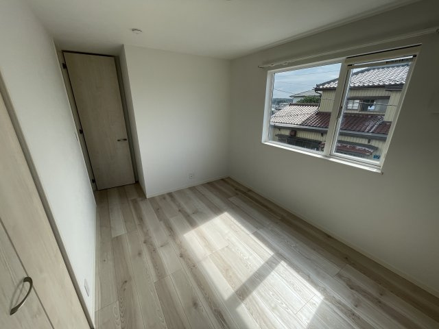 スカイタウン土気の洋室