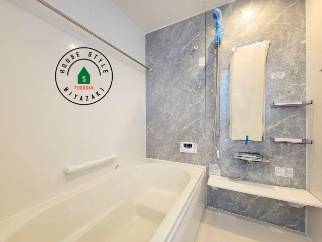 宮崎市島之内Ⅱ期（2号棟）の内観：施工例|1日の疲れを癒してくれる広々バスルーム。雨の日のお洗濯にも大活躍な浴室乾燥機付です！