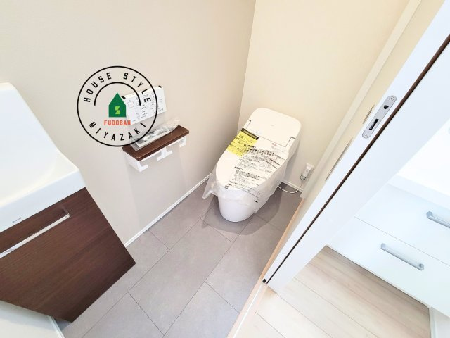 宮崎市島之内Ⅱ期（2号棟）の内観：施工例|温水洗浄便座を完備しております。