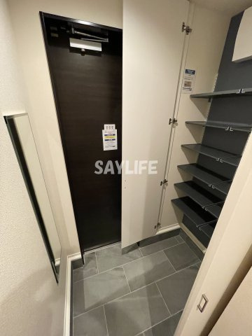 オークメゾン加美の玄関