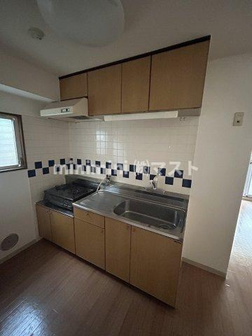 メロディーハイム九条のキッチン|※別号室参考写真