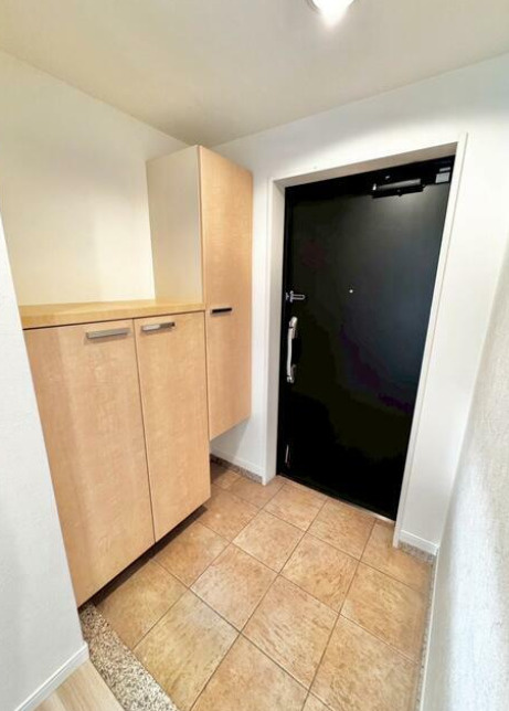 アルフィーネステーションプラザ春日の玄関