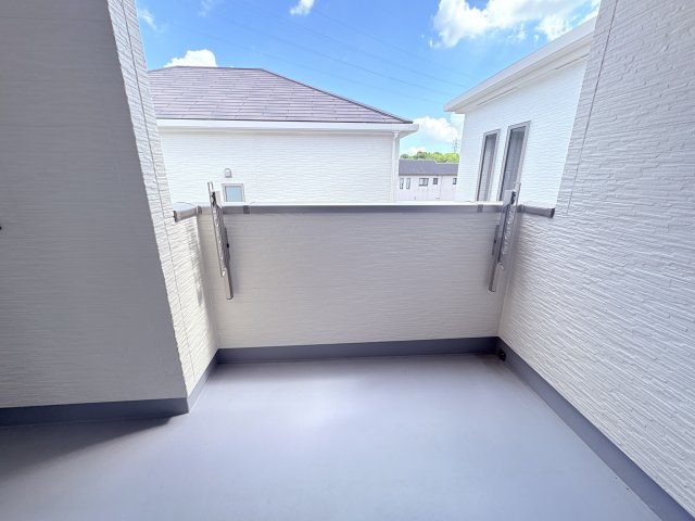 ハートフルタウンうるま市石川楚南2号棟のバルコニー