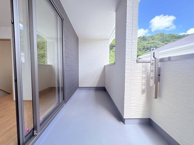 ハートフルタウンうるま市石川楚南2号棟のバルコニー