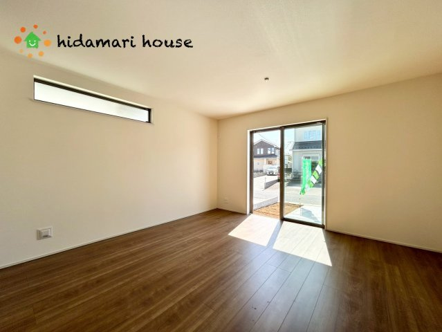 伊奈町西小針1丁目　新築戸建　ハートフルタウンEの居間・リビング