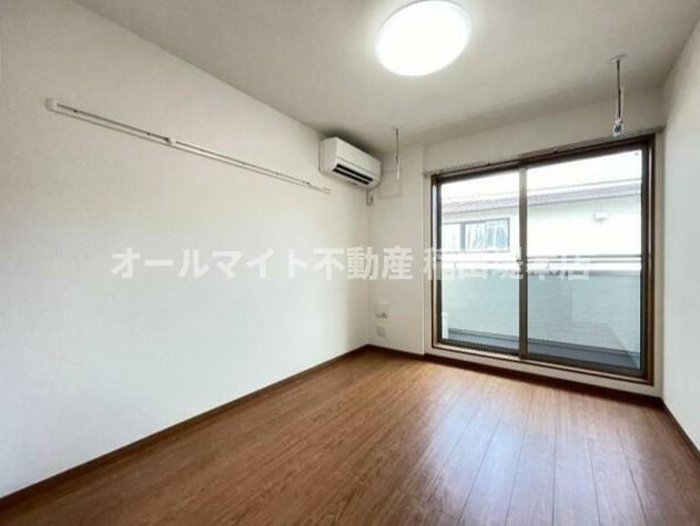 川崎市多摩区東生田１丁目のアパートの居間・リビング