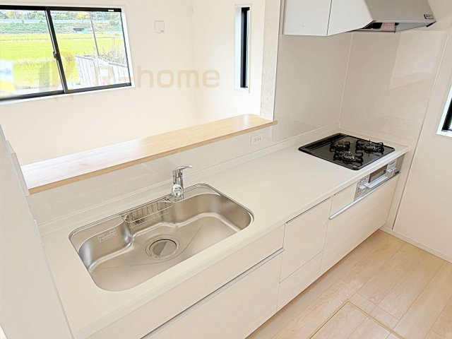 つくば市北中島第3　新築戸建て　1号棟のキッチン|料理をしながら家族とコミュニケーションが取れる対面式システムキッチン。