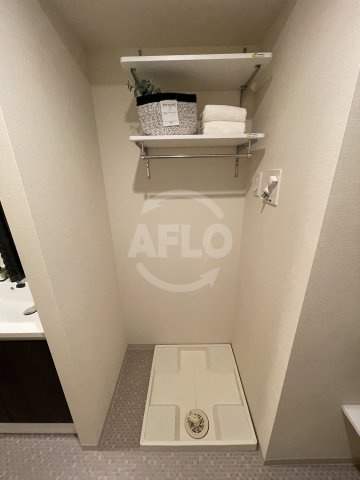 シーズンフラッツ靭本町の設備|シーズンフラッツ靭本町　室内洗濯機置き場
