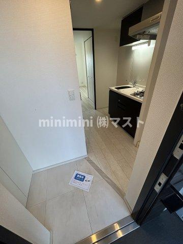 エステムプラザ福島ジェネルの玄関