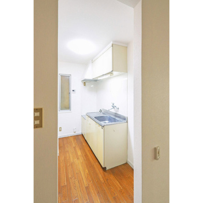 【キッチン】 | 長門石ビレッジ | ※オールフローリングの別室の写真です