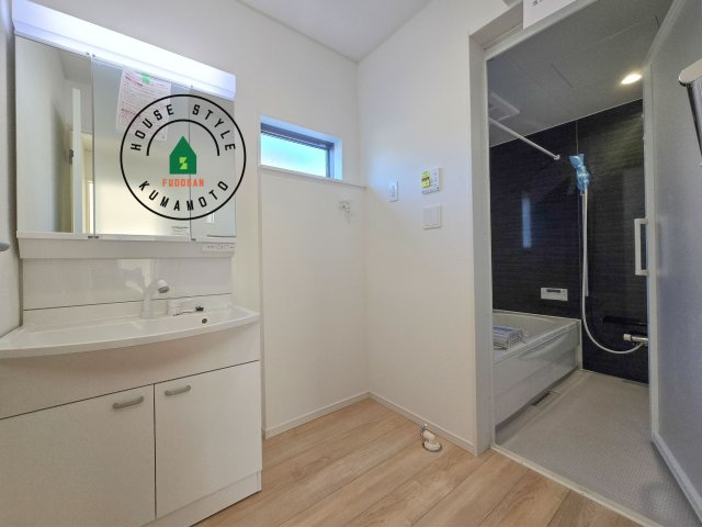 熊本市北区池田3丁目第2-2棟（1号棟）の内観：施工例|脱衣所、洗面所は小さなプライベートスペース。歯磨き、洗顔と毎日施す個人空間。