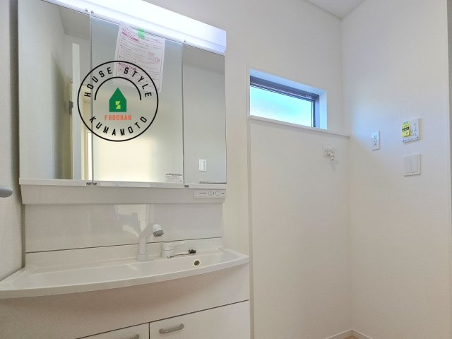 熊本市北区池田3丁目第2-2棟（1号棟）の内観：施工例|洗面所は小さなプライベートスペース。歯磨き、洗顔と毎日施す個人空間。