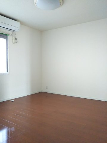 サーパス久保田南の洋室