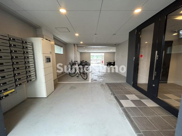 トラストビル姪浜のエントランス