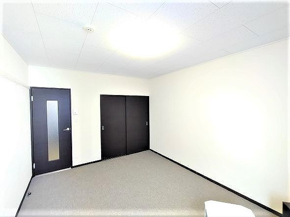 レオネクストＴｏｍａⅠの居間・リビング