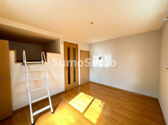 コンフォートベネフィス姪浜４の居間・リビング