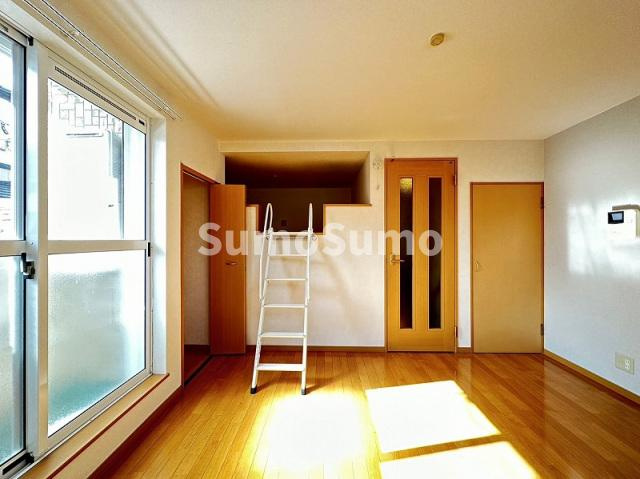 コンフォートベネフィス姪浜４の居間・リビング