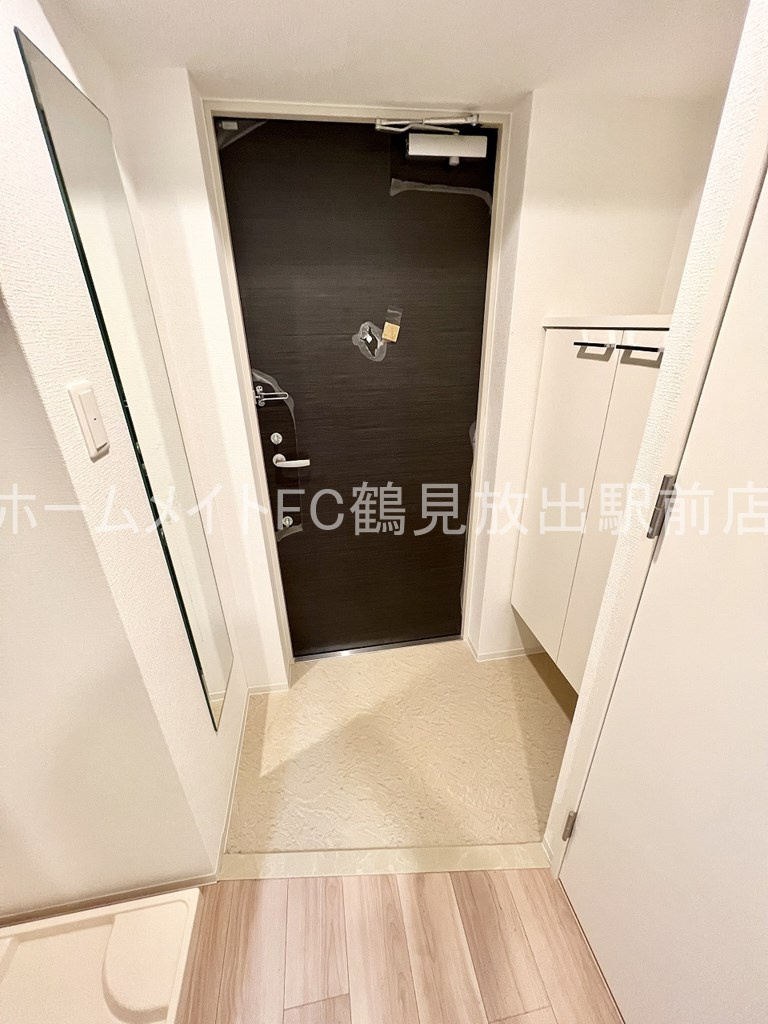 大阪市城東区諏訪１丁目の賃貸マンションの玄関