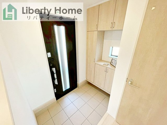 水戸市内原町984番　新築戸建　A号棟の玄関