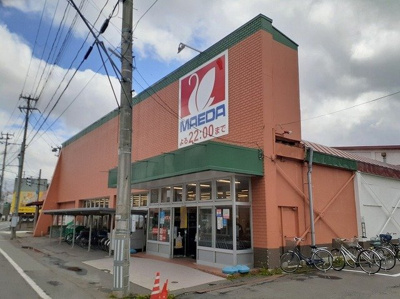 【周辺】 | フラワーガーデン神 | マエダストア旭町店まで630m