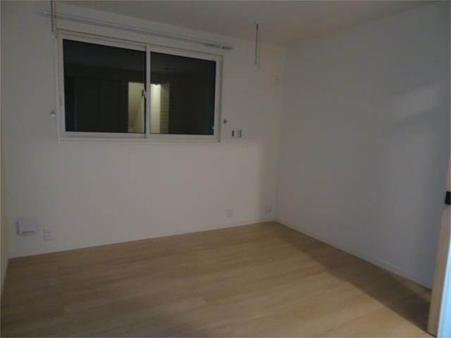 狛江市駒井町３丁目のアパートの寝室