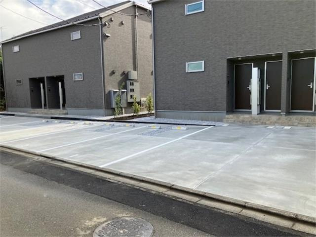 狛江市駒井町３丁目のアパートの駐車場