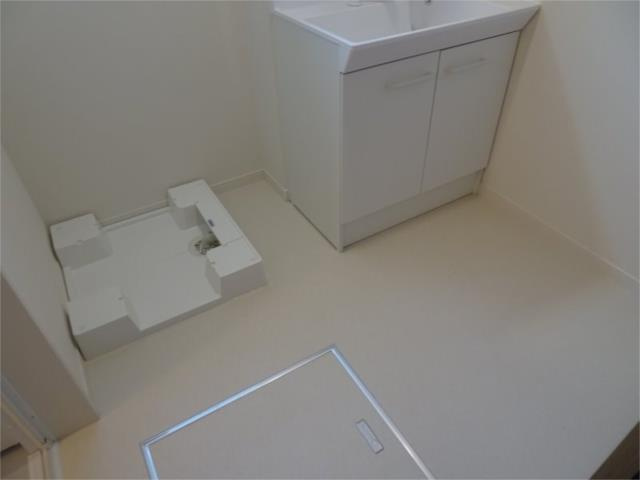 狛江市駒井町３丁目のアパートの居間・リビング