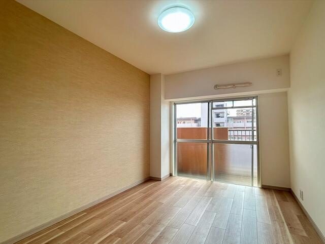 ニューコーポ港楽Ａ棟の洋室